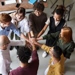 Top view of diverse group of people collaborating in office setting.